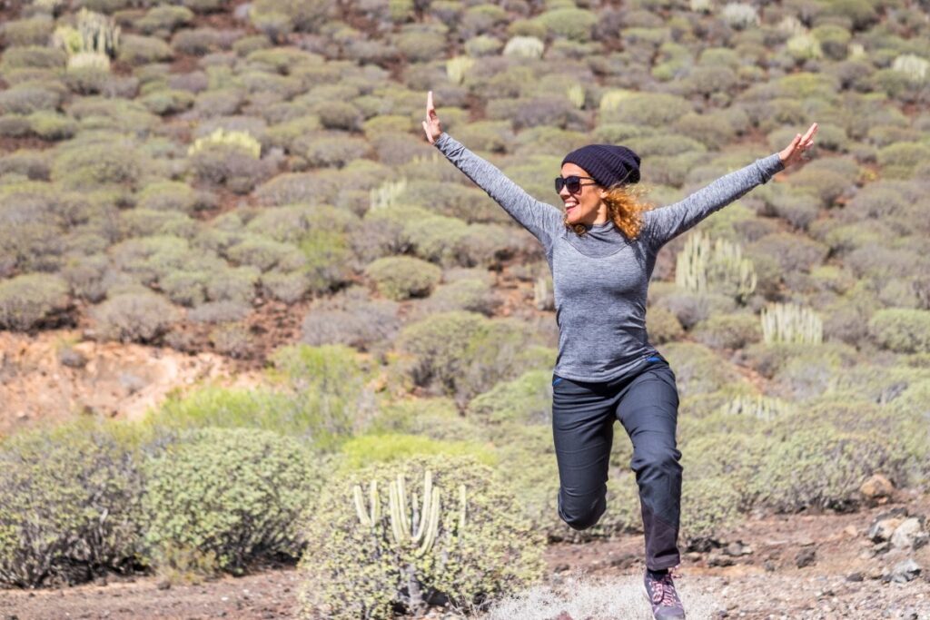 A woman enjoys jogging on a trail after shedding the weight that held her back. Her choices, and her freedom, have grown sinc she had weight loss treatment in Arcadia.